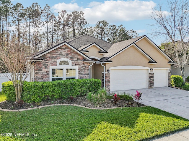 view of front of property featuring a front lawn, a garage, driveway, and stucco siding