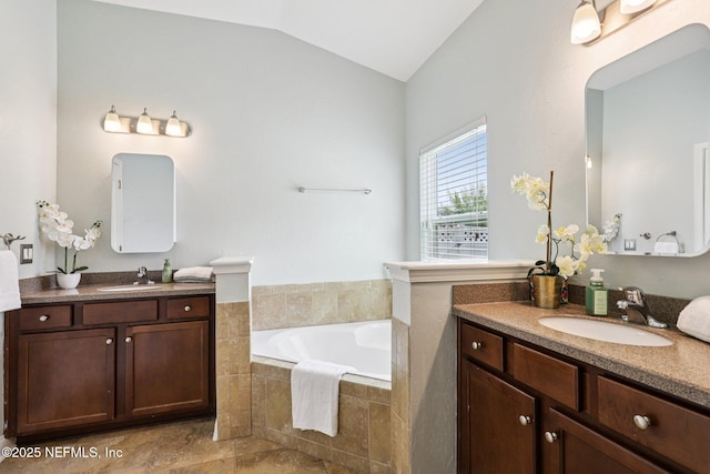 741 W Kings College Dr, Saint Johns, FL 32259 - full bath with two vanities, a bath, and vaulted ceiling