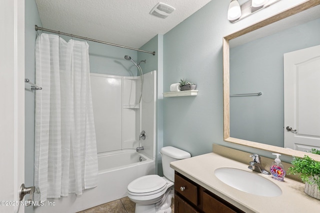 741 W Kings College Dr, Saint Johns, FL 32259 - bathroom with shower / bath combo with shower curtain, vanity, a textured ceiling, and tile patterned flooring