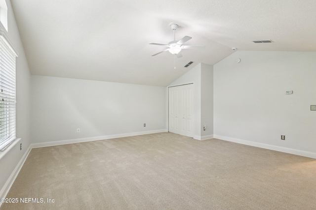 741 W Kings College Dr, Saint Johns, FL 32259 - additional living space with lofted ceiling, light colored carpet, and ceiling fan