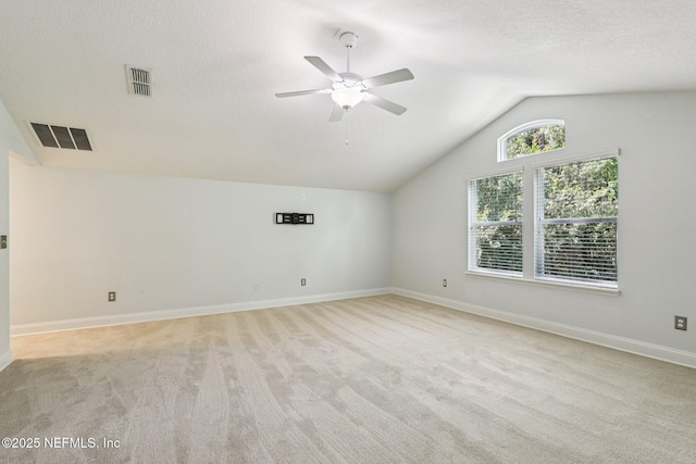 741 W Kings College Dr, Saint Johns, FL 32259 - bonus room with light carpet, vaulted ceiling, ceiling fan, and a textured ceiling