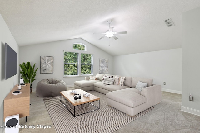 741 W Kings College Dr, Saint Johns, FL 32259 - carpeted living room with a ceiling fan and vaulted ceiling