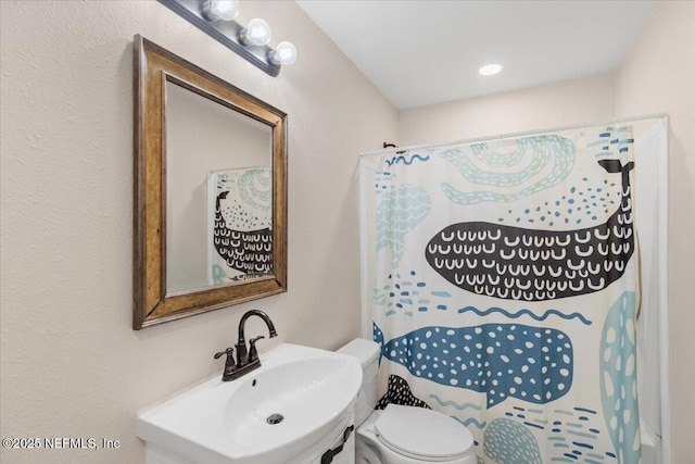 bathroom featuring a sink and toilet