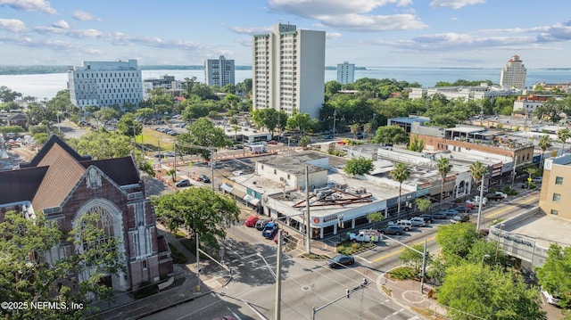 drone / aerial view with a view of city and a water view