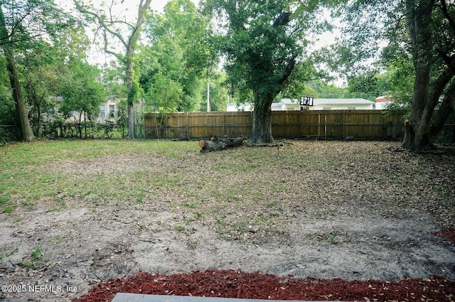 view of yard featuring fence