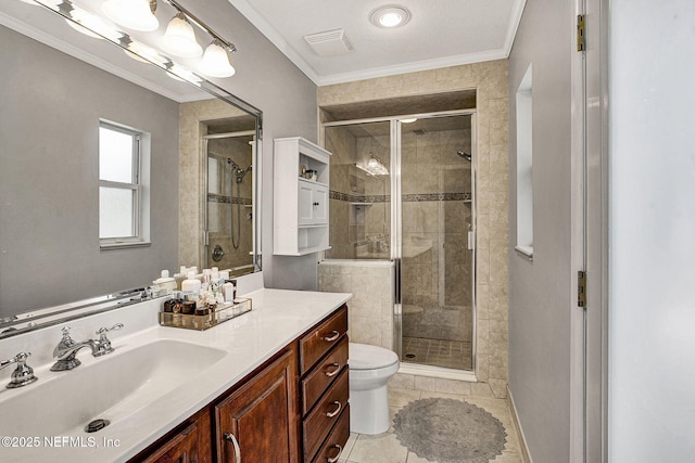 full bath featuring toilet, a stall shower, crown molding, and vanity