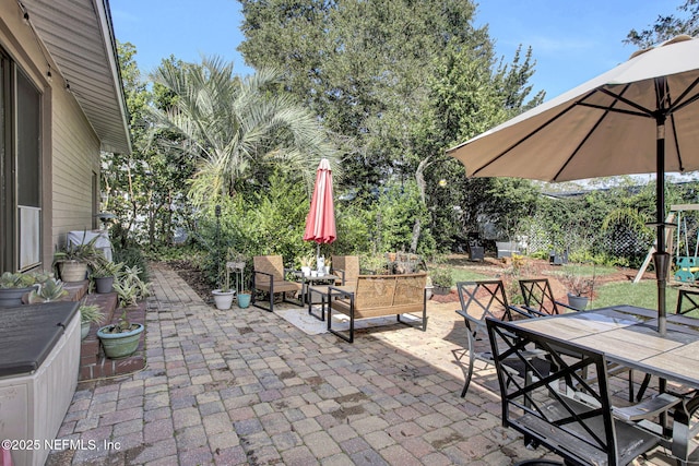 view of patio with outdoor dining area