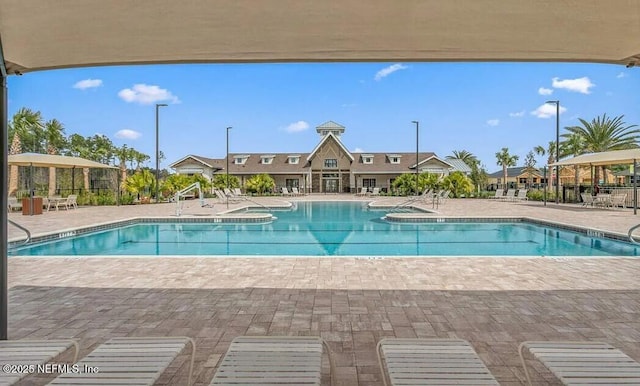 community pool with a patio