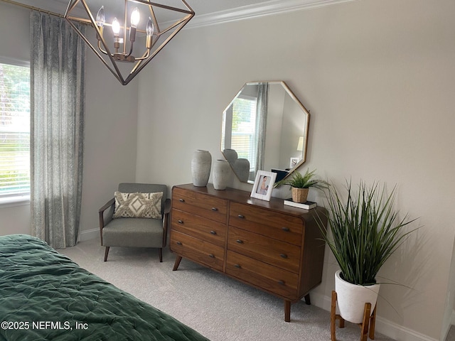 bedroom with a chandelier, ornamental molding, baseboards, and light colored carpet