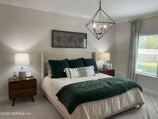 carpeted bedroom with baseboards, an inviting chandelier, and crown molding