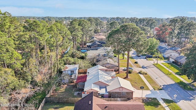 bird's eye view featuring a view of trees