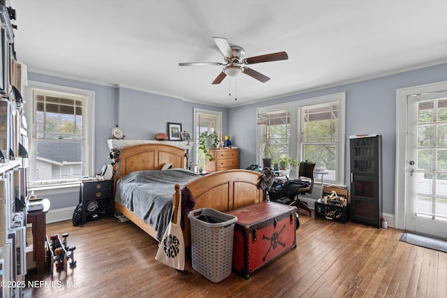 bedroom featuring access to exterior, ceiling fan, baseboards, and hardwood / wood-style floors