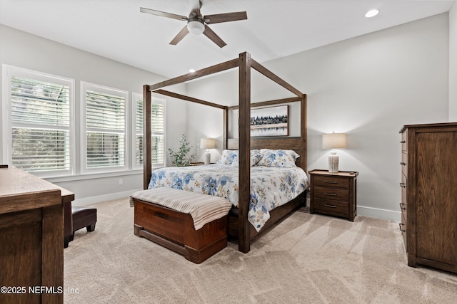 bedroom featuring light carpet, baseboards, a ceiling fan, and recessed lighting