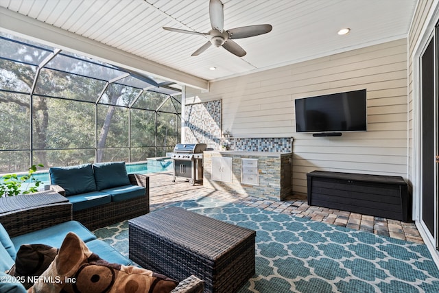 view of patio featuring a lanai, ceiling fan, an outdoor hangout area, and area for grilling