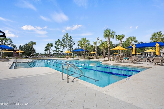 pool with a patio