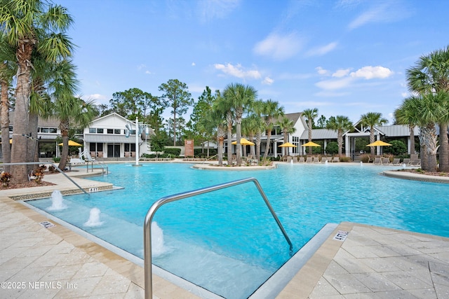 community pool featuring a patio area