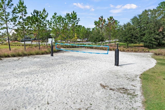 view of property's community featuring volleyball court