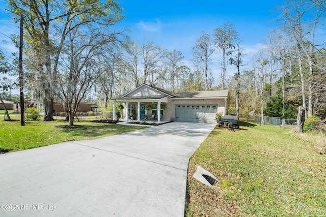 view of front facade with a front lawn, fence, a porch, concrete driveway, and a garage