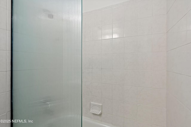 bathroom with shower / bathing tub combination