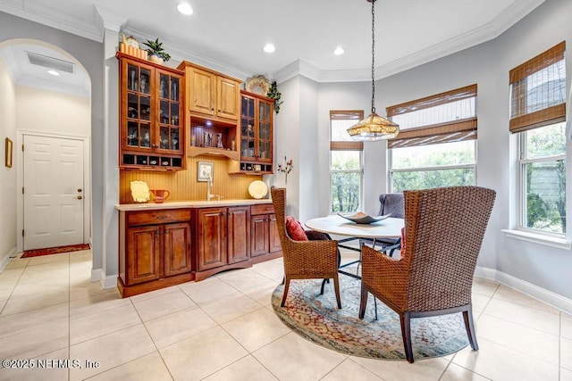 dining space featuring ornamental molding, light tile patterned flooring, recessed lighting, and baseboards