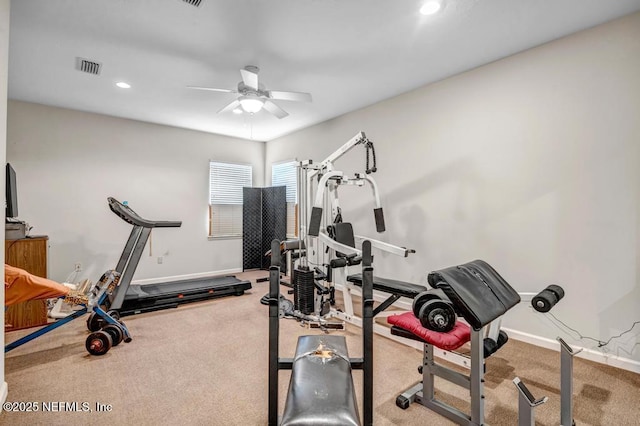 exercise area featuring ceiling fan, carpet, visible vents, and baseboards