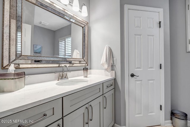 bathroom featuring visible vents and vanity