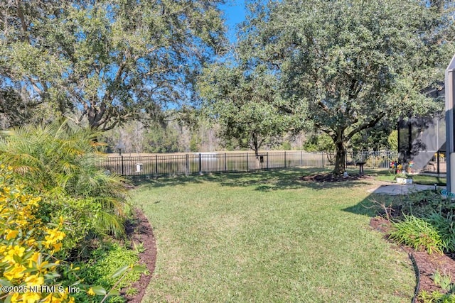 view of yard with fence