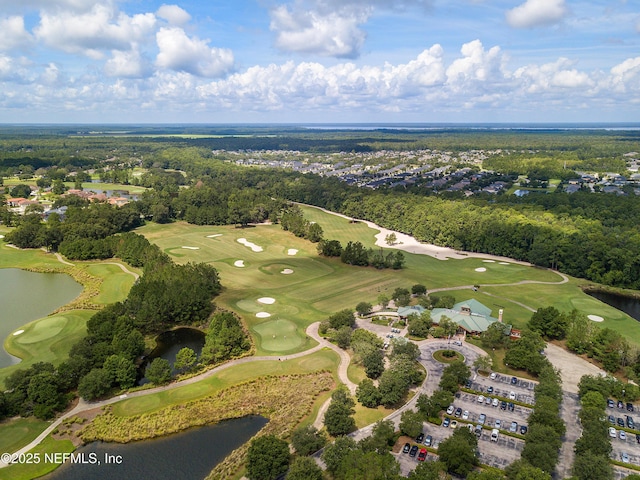 bird's eye view featuring golf course view and a water view