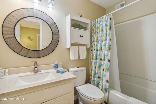 bathroom featuring toilet, shower / bath combo, visible vents, and vanity