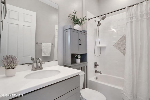 bathroom featuring toilet, vanity, and shower / tub combo with curtain