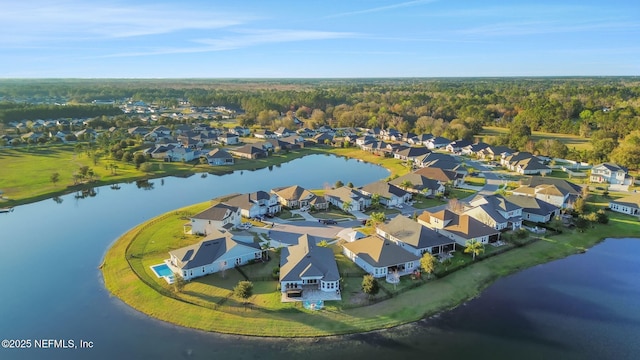 aerial view featuring a water view and a residential view