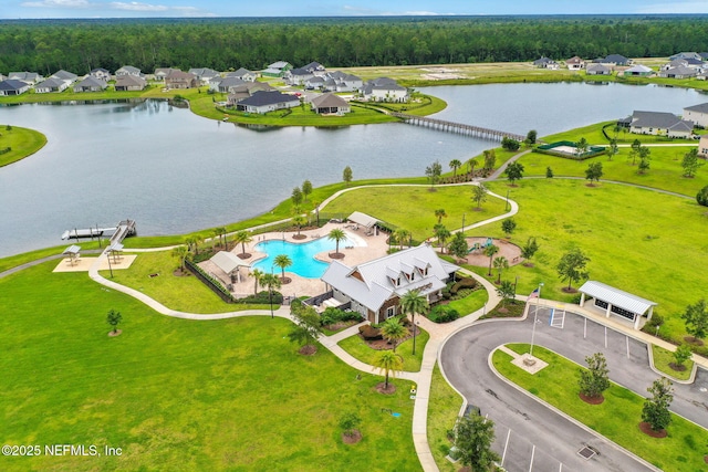 aerial view featuring a water view and a residential view