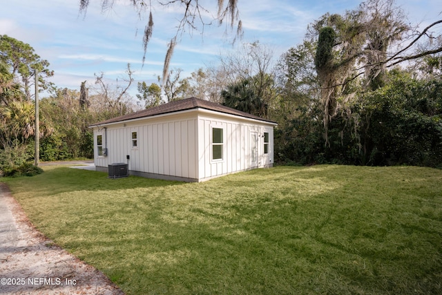 view of outbuilding featuring cooling unit