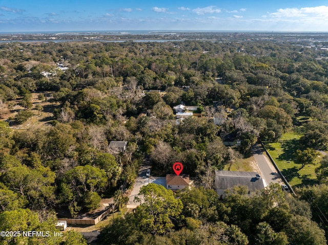 aerial view featuring a view of trees