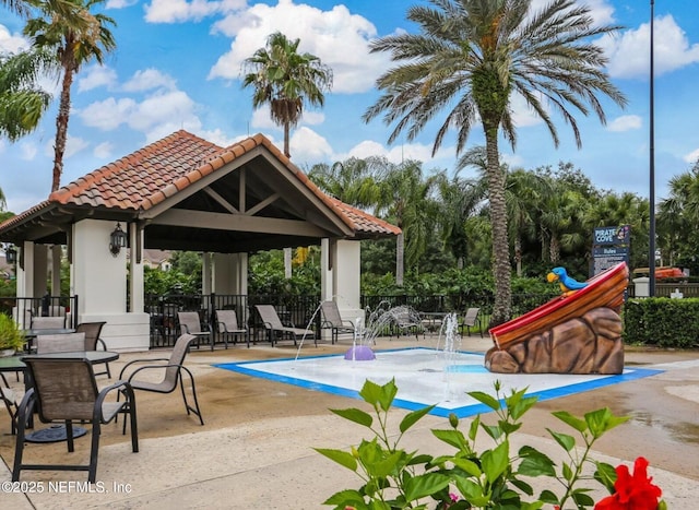 view of pool featuring a gazebo, a patio, and fence