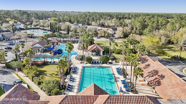 bird's eye view featuring a wooded view