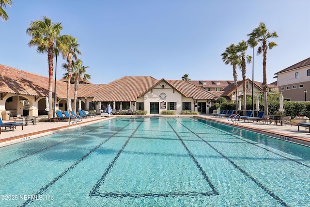 community pool featuring a patio area