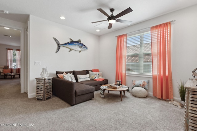 living room with a ceiling fan, carpet, baseboards, and recessed lighting