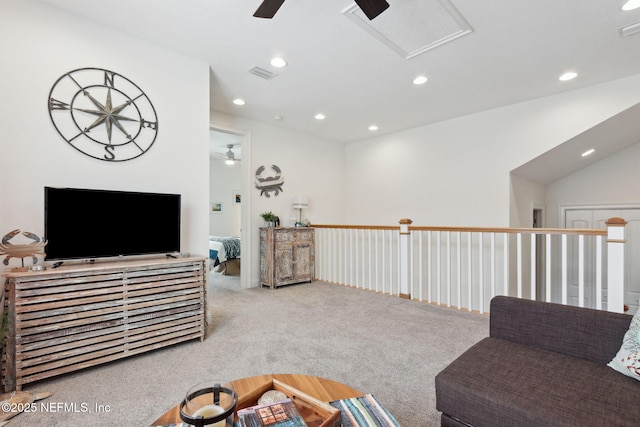 carpeted living area featuring a ceiling fan, recessed lighting, and visible vents