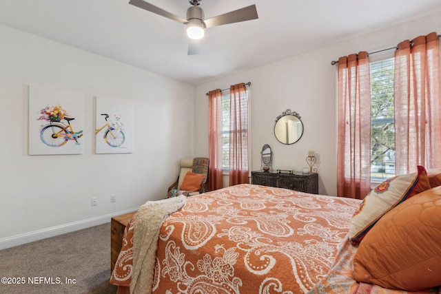 bedroom featuring ceiling fan, carpet flooring, and baseboards