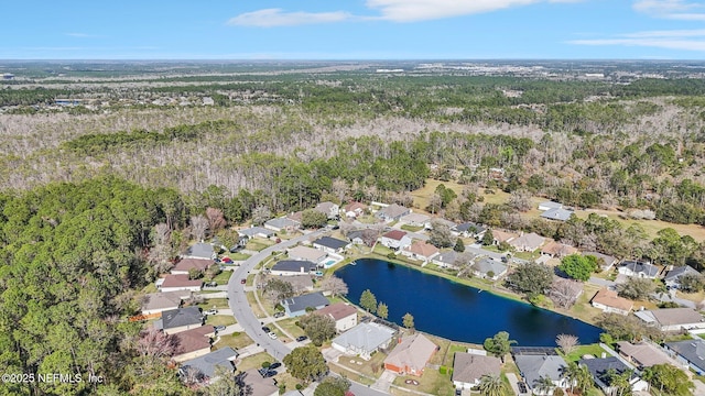 birds eye view of property featuring a water view and a residential view