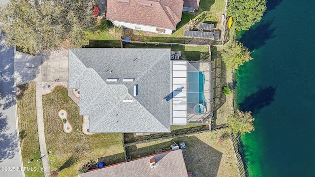 birds eye view of property featuring a water view