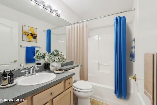 full bath featuring vanity, toilet, and shower / bath combo with shower curtain