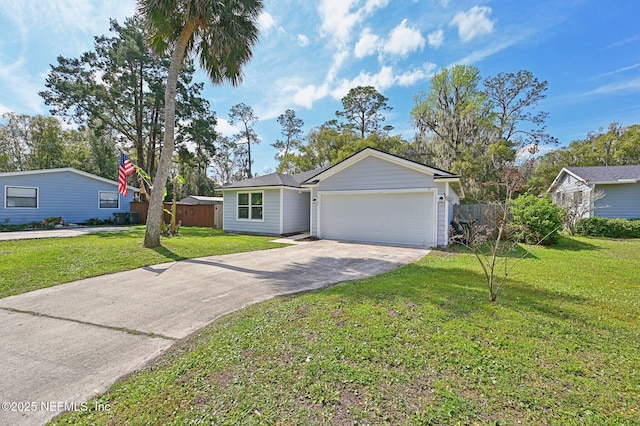 ranch-style house featuring driveway, a garage, fence, and a front lawn