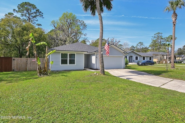 ranch-style house with driveway, an attached garage, fence, and a front lawn