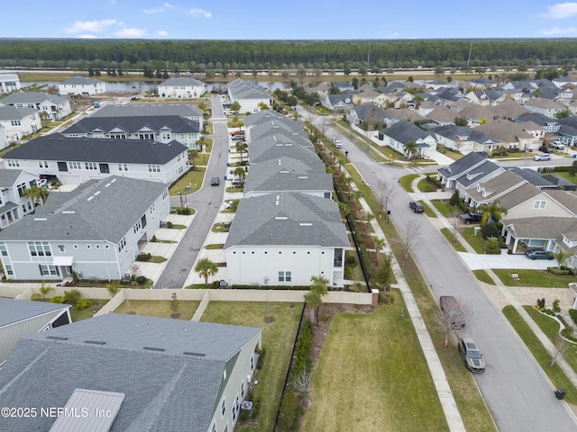 aerial view featuring a water view and a residential view