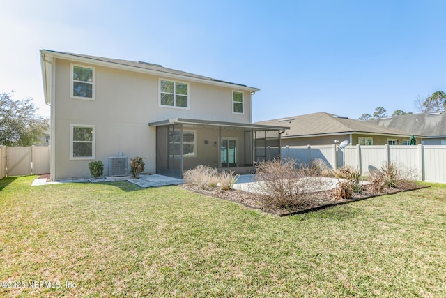 back of property with cooling unit, a fenced backyard, a sunroom, a lawn, and stucco siding