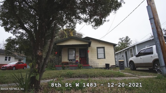 bungalow-style house with covered porch