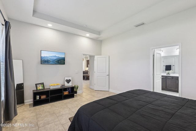 bedroom with light tile patterned floors, recessed lighting, visible vents, baseboards, and a raised ceiling