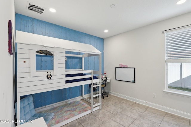 tiled bedroom with recessed lighting, visible vents, baseboards, and multiple windows